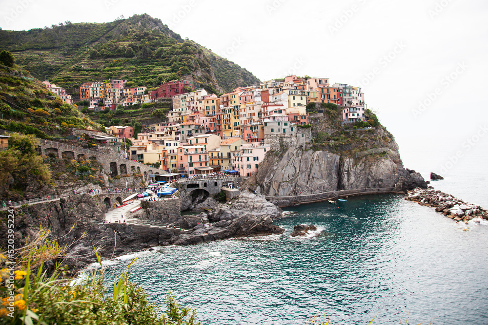 Panoramic view of hills leading down to coast. Italy coast is most popular travel and holiday destination in Europe.