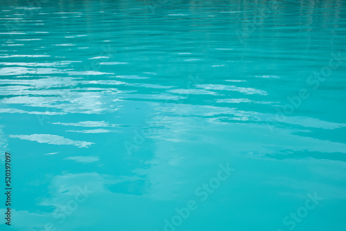 Turqouise blue lake water background