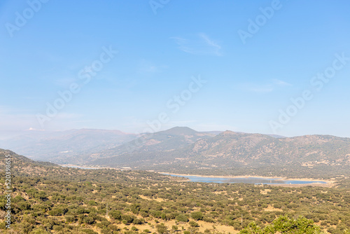 Majestic and wonderful landscape of the reservoir or dam of Plasencia  Extremadura at sunset. Concept of calm  fun  adventure and rural life