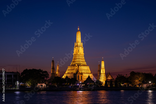 Long exposure of wat arun temple at twilight in Bangkok, Thailand