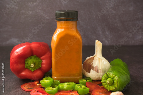 Fototapeta Naklejka Na Ścianę i Meble -  Low calorie diet. Cold vegetable soup for the summer served in a bottle, ready to take to the beach or the field for a picnic. Fresh and healthy food.