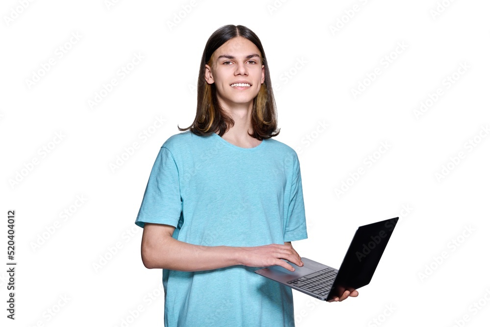 Guy teenager with a laptop on a white isolated background. Guy teenager with a laptop on a white isolated background.