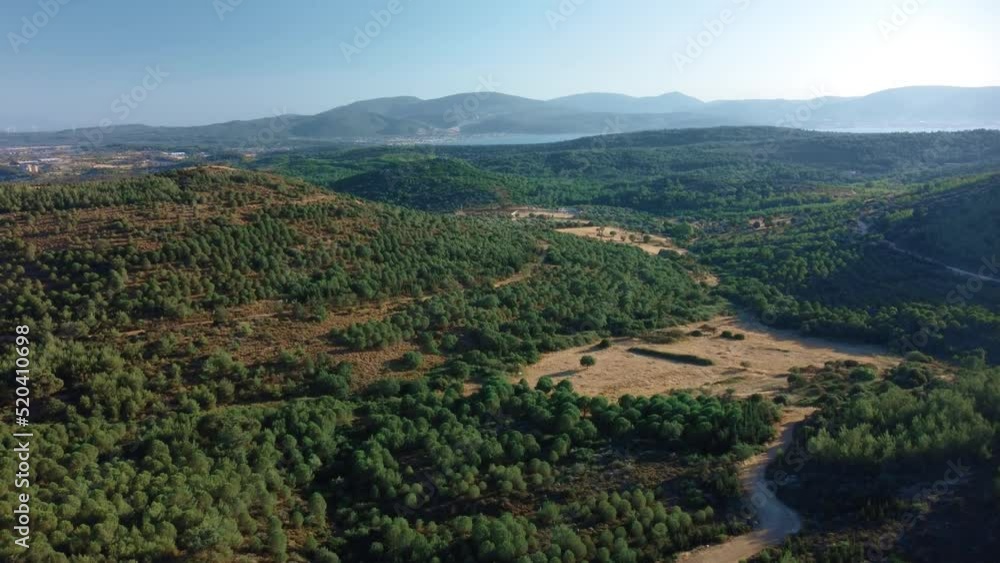 flying over of agricultural landscape with many fields, farmlands ,sea and mountain background . High quality 4k footage flying over of agricultural landscape with many fields, farmlands ,sea and mountain background . High quality 4k footage