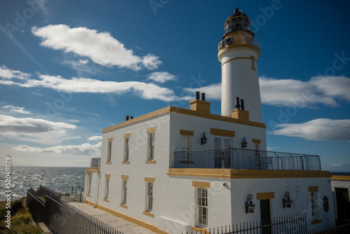 The turnberry lighthouse overlooking the west coast of scotland from the Ayrshire coast. This are of stunning natural beauty is home to a nearby golf course photo