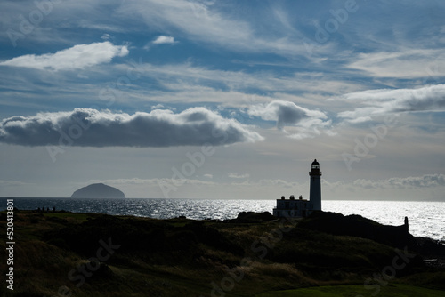 Fotografie, Obraz A silhouette shot from Ayrshire in the west coast of scotland capturing the isla