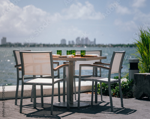 table and chairs on the terrace luxury restaurant miami 