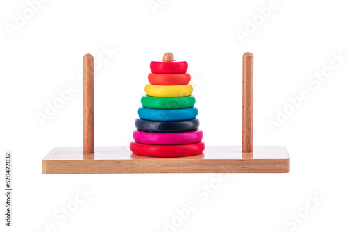 Wooden puzzle tower of hanoi with color rings isolated on white background. Toy for kids.