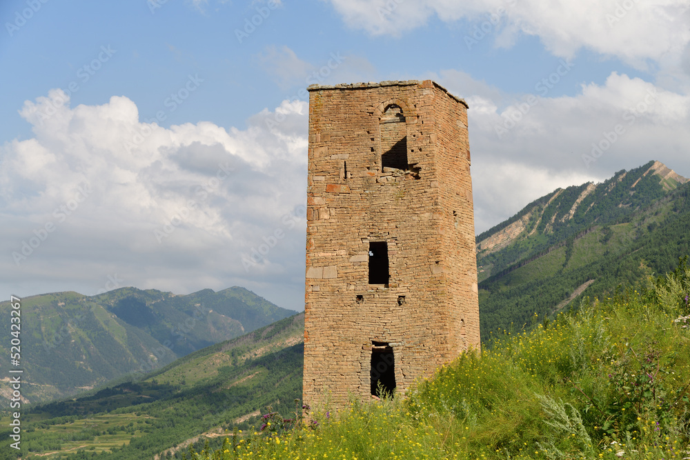 Tower of old village Goor in Dagestan, Russia. Panoramic view of the ancient Goor settlement Tower of old village Goor in Dagestan, Russia. Panoramic view of the ancient Goor settlement