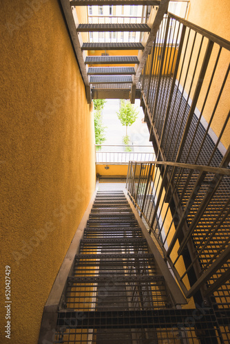 Canvastavla Internal metal fire escapes of a modern building, modern metal ladder