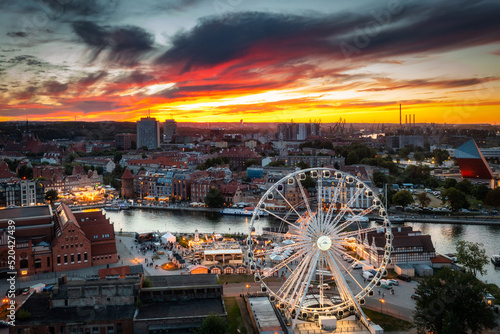 Ferris wheel in Gdansk by the Motlawa River at sunset, Poland © Patryk Kosmider