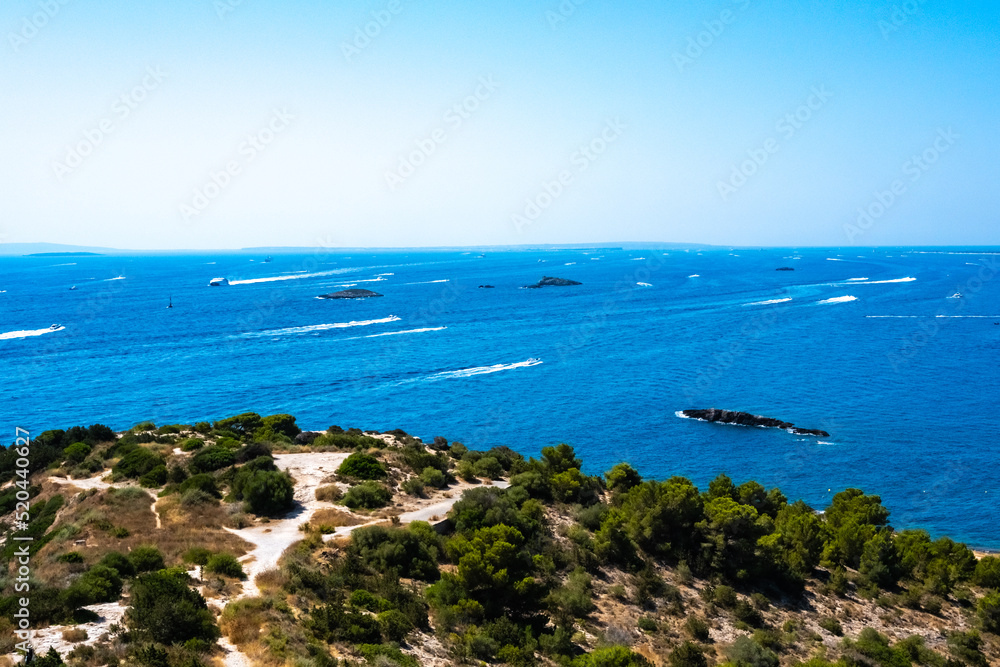 Ibiza, spain - July 25, 2022: Ships leave the seaport of Ibiza in the direction of Formentera