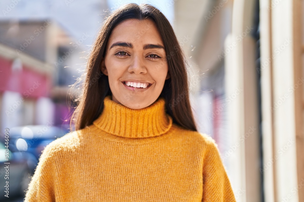 Young hispanic woman smiling confident standing at street Young hispanic woman smiling confident standing at street