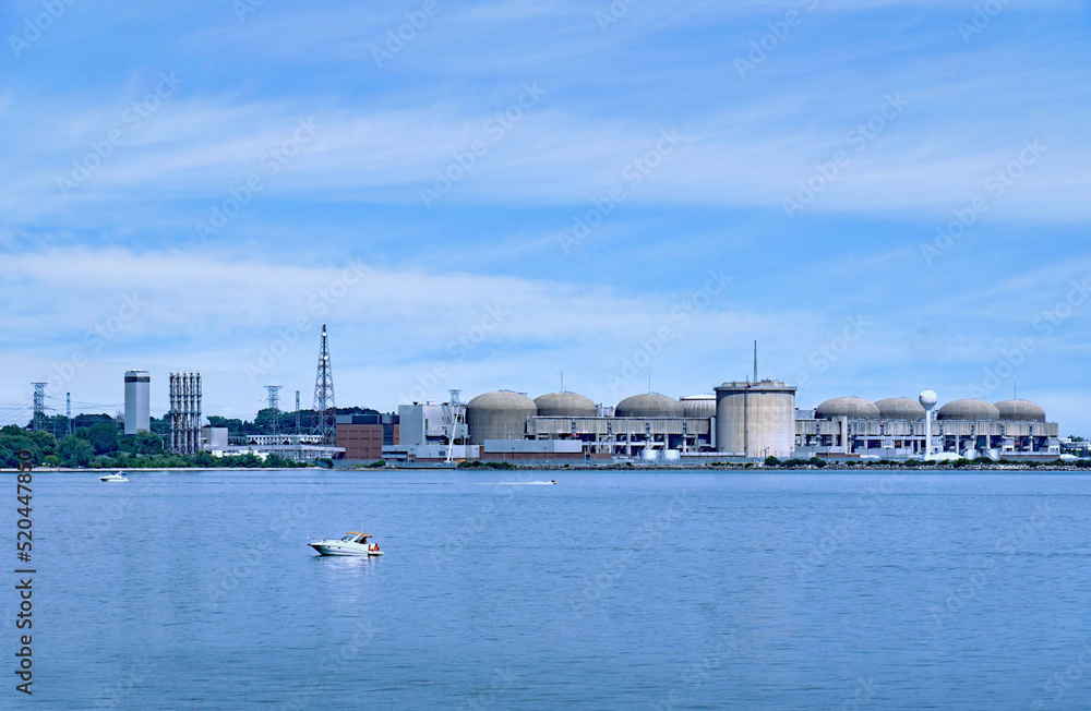 Boaters on Lake Ontario enjoy a summer day in front of the Pickering Nuclear Power Generating station in the Toronto area
