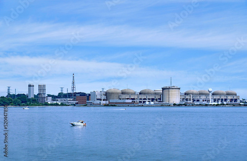 Photography Boaters on Lake Ontario enjoy a summer day in front of the Pickering Nuclear Pow