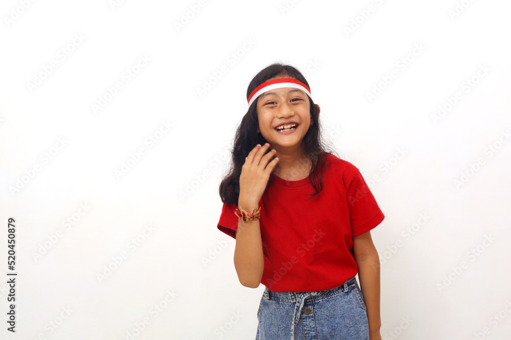 Cheerful asian little girl standing and laughing. Isolated on white with copyspace. Cheerful asian little girl standing and laughing. Isolated on white with copyspace.