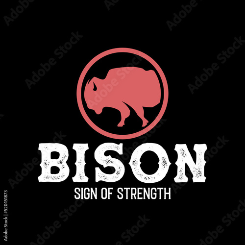 Simple bison logo vector illustration in circle with vintage text isolated on dark black background