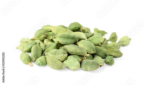 Pile of dry cardamom seeds on white background