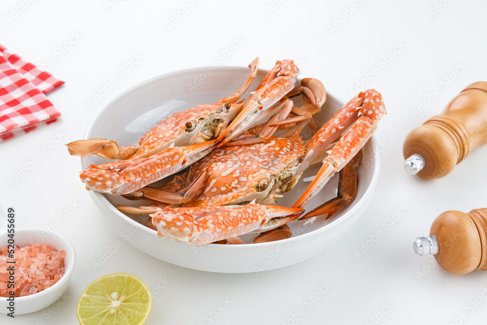 Steamed Blue Crab served on plate, food preparation Steamed Blue Crab served on plate, food preparation