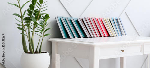 Table with different books ...