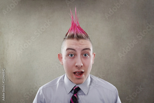 Quadro su tela Surprised teen with a pink mohawk haircut