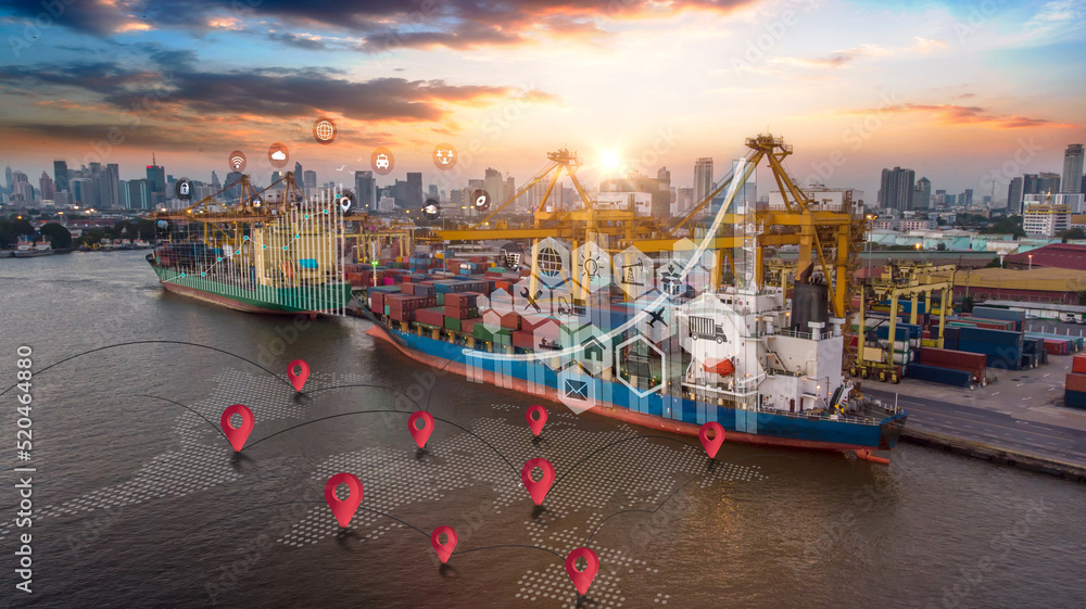 Aerial view and top view cargo ship port in the export-import business and logistics international Shipping cargo to harbor by crane with World map with logistic network distribution on background.