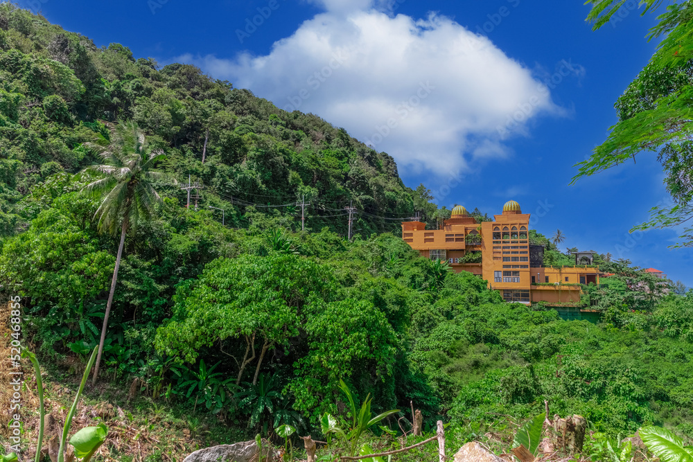 Fototapeta premium Phuket Mountains over looking Karon Beach lovely Skies Sunset over Patong Pa Tong Beach in Phuket island Thailand. Lovely lush green mountains colourful skies