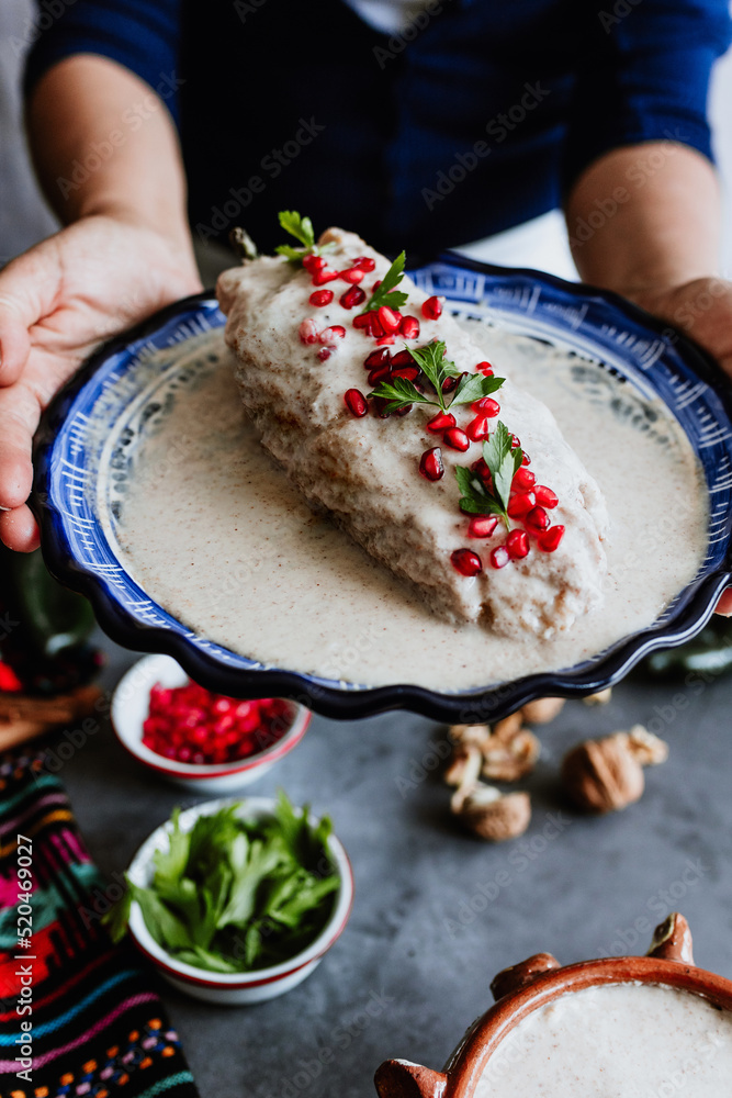 Mexican Woman Hands Preparing And Cooking Chiles En Nogada Recipe With ...