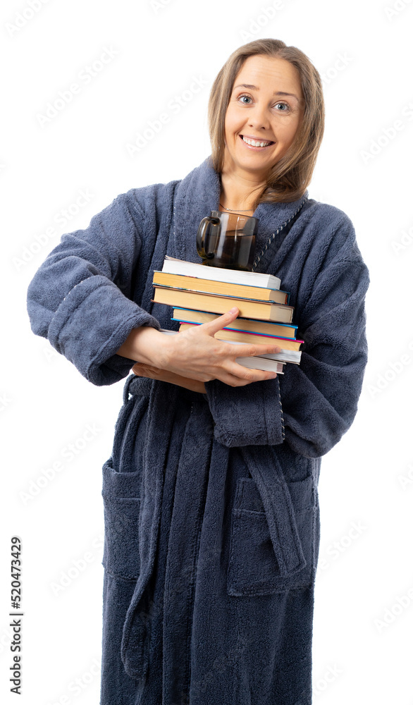 A woman in a bathrobe holds a lot of books and a mug of water. drink a lot and stay at home - the key to health. relaxes with an interesting book. Self isolation. coronavirus, flu, epidemic. isolated. A woman in a bathrobe holds a lot of books and a mug of water. drink a lot and stay at home - the key to health. relaxes with an interesting book. Self isolation. coronavirus, flu, epidemic. isolated.