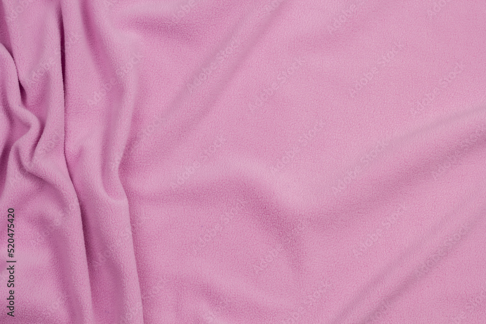 Fototapeta premium Fleece fabric blue top view. Texture of textile fleece bedspread. 