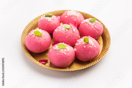 Delicious Pink Chumchum or rose flavour cham cham or Rasgulla or Rasagola, Rosogola, Rosogolla photo