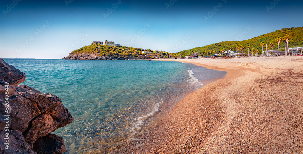 Early morning view of Jale Baech. Adorable summer scene of Albania, Europe. Nice summer seascape of Adriatic sea. Vacation concept background.