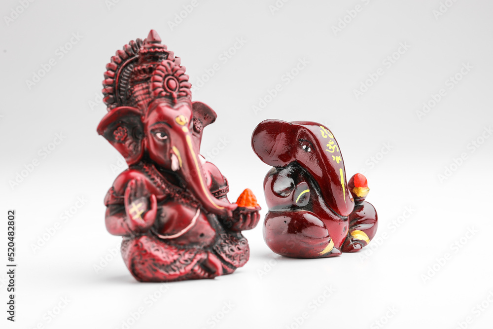 Lord ganesha sculpture on white background.