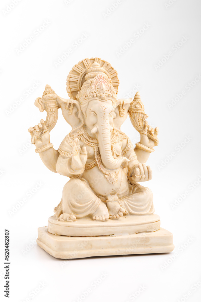 antique lord ganesha sculpture on white background.