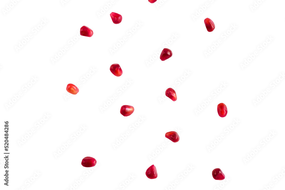 Falling pomegranate grains isolated on a white background