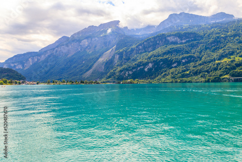 View of the Lake Brienz and Swiss Alps in Brienz, Switzerland © olyasolodenko