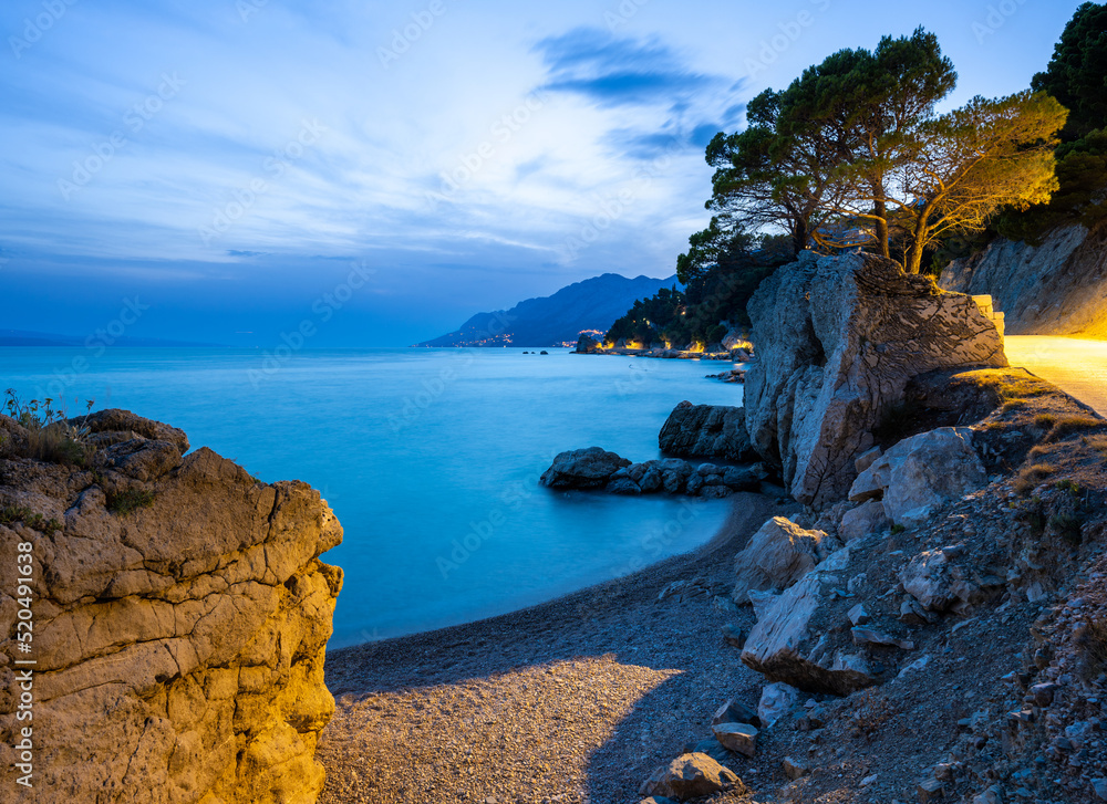 beach at evening in Brela on Makarska riviera, Dalmatia in Croatia