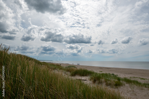 Fototapeta Naklejka Na Ścianę i Meble -  Silent summer afternoon at Baltic sea, Liepaja, Latvia.