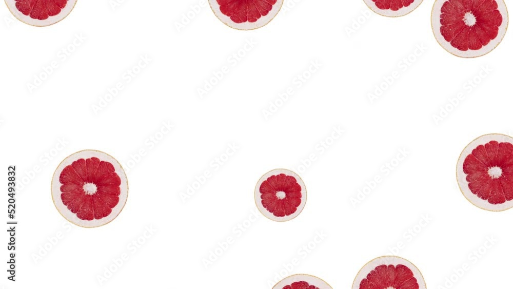 Minimal motion design - Grapefruit slices rotating and moving down white color background. Trendy colors and style graphics. Seamless looping animation. Minimal motion design - Grapefruit slices rotating and moving down white color background. Trendy colors and style graphics. Seamless looping animation.