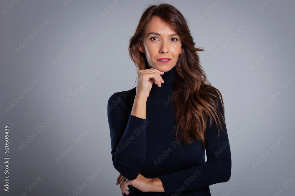 Close-up studio portrait of attractive middle aged woman Close-up studio portrait of attractive middle aged woman