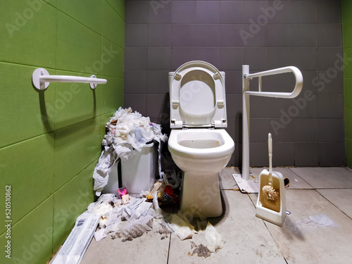 Εκτύπωση καμβά Dirty uncleaned public toilet for the disabled with an overflowing wastebasket