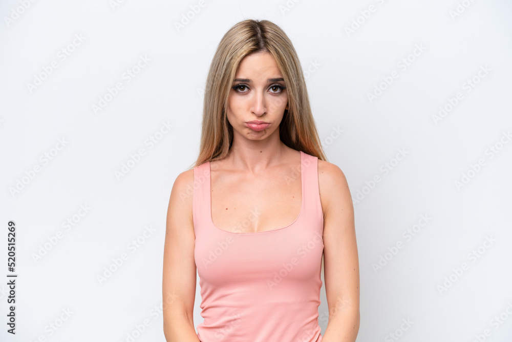 Pretty blonde woman isolated on white background with sad expression Pretty blonde woman isolated on white background with sad expression
