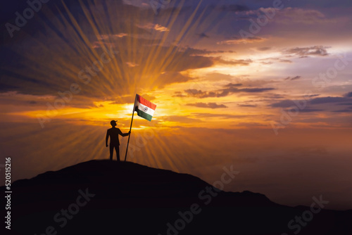 Independence day concept : indian man holding indian flag