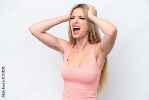 Pretty blonde woman isolated on white background stressed overwhelmed