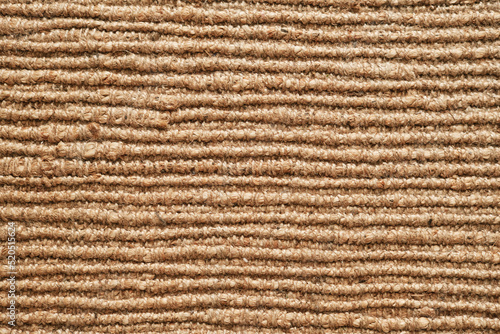 Texture of the woven jute carpet. Natural organic fiber