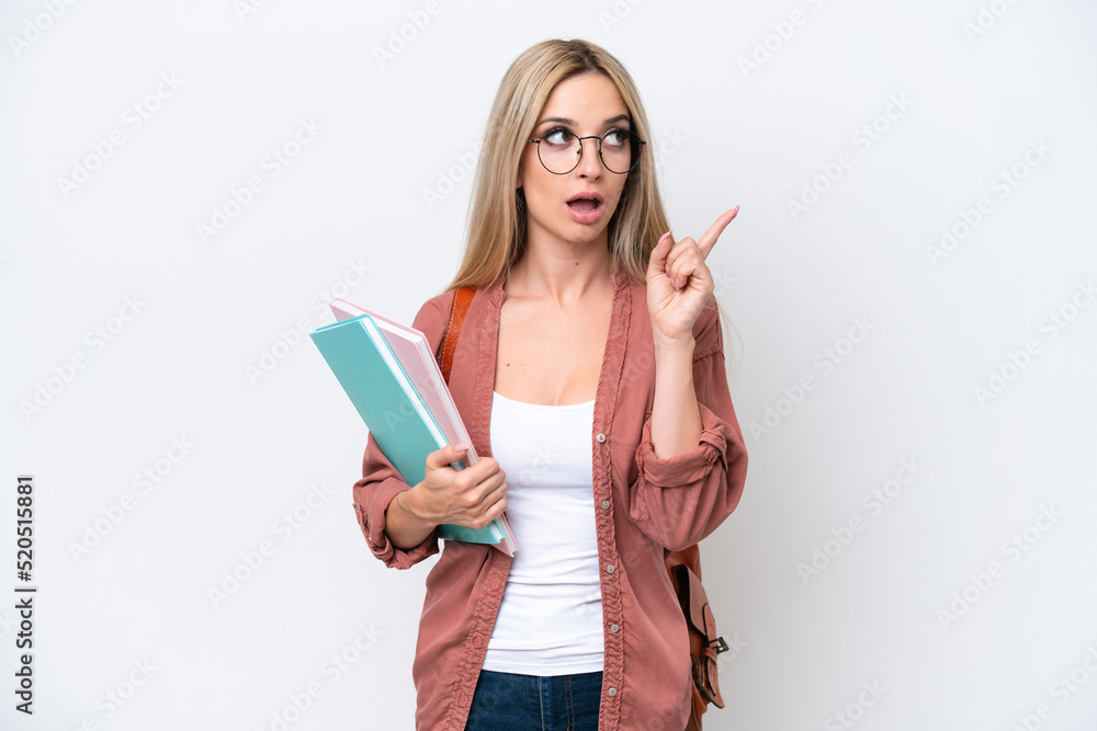Pretty student blonde woman isolated on white background thinking an idea pointing the finger up Pretty student blonde woman isolated on white background thinking an idea pointing the finger up