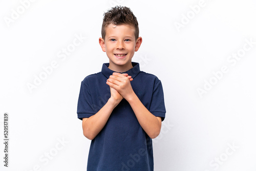 Little caucasian boy isolated on white background laughing