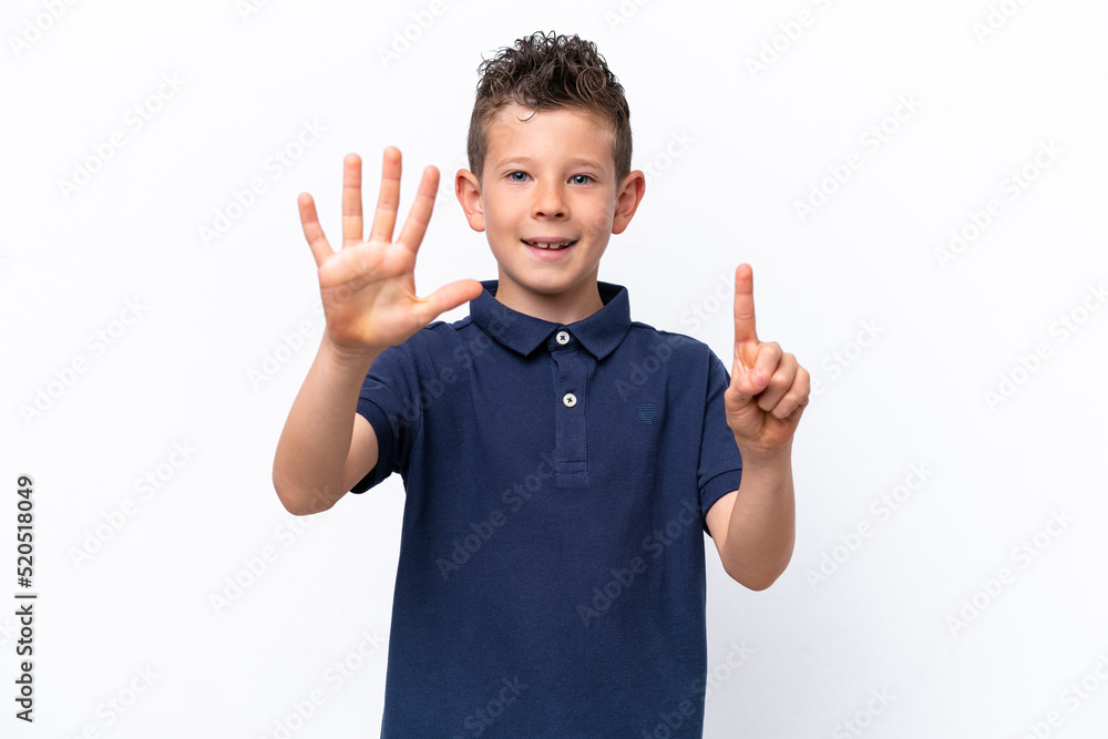 Little caucasian boy isolated on white background counting six with fingers Little caucasian boy isolated on white background counting six with fingers