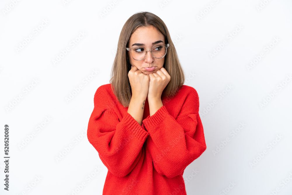 Young caucasian woman isolated on white background With glasses and tired Young caucasian woman isolated on white background With glasses and tired