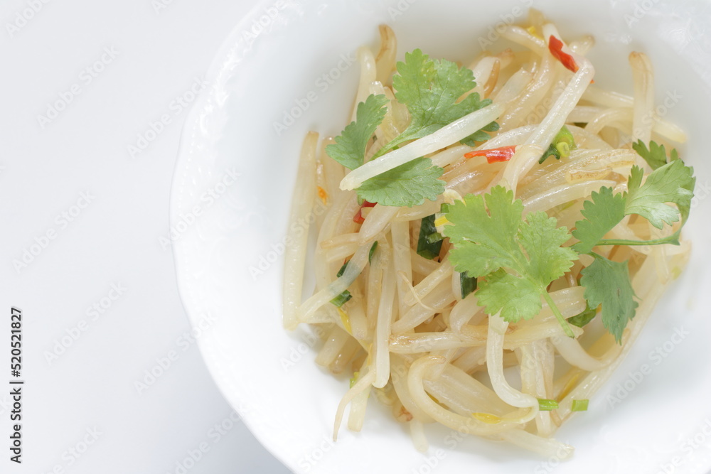 Chinese food, soy sprout stir fried served with coriander leaves