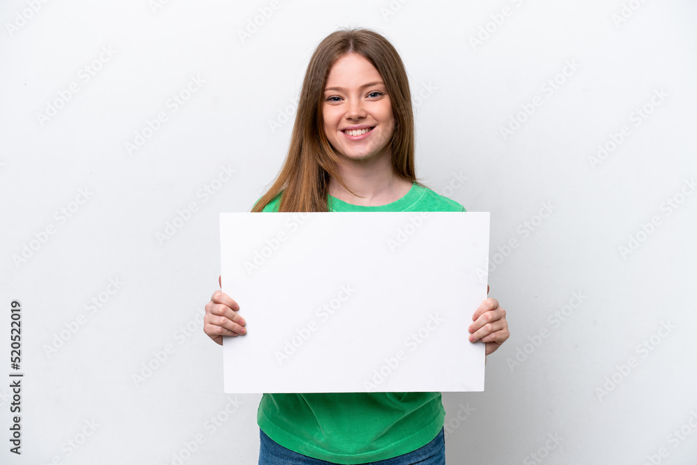 Young caucasian woman isolated on white background holding an empty placard with happy expression Young caucasian woman isolated on white background holding an empty placard with happy expression